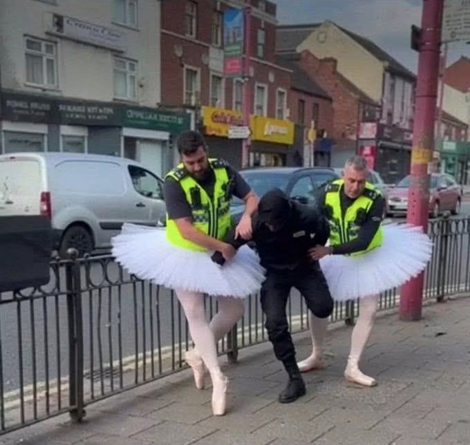 nigger fights off 2 brit cops- using their own baton on them